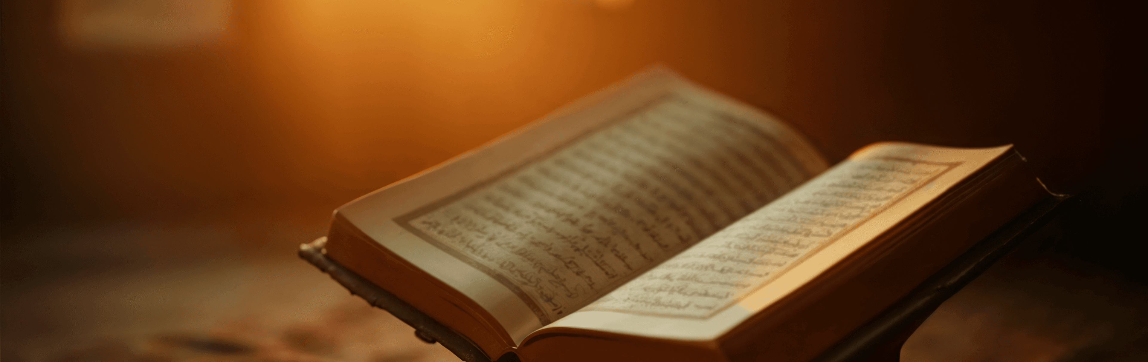 Open Quran with detailed calligraphy