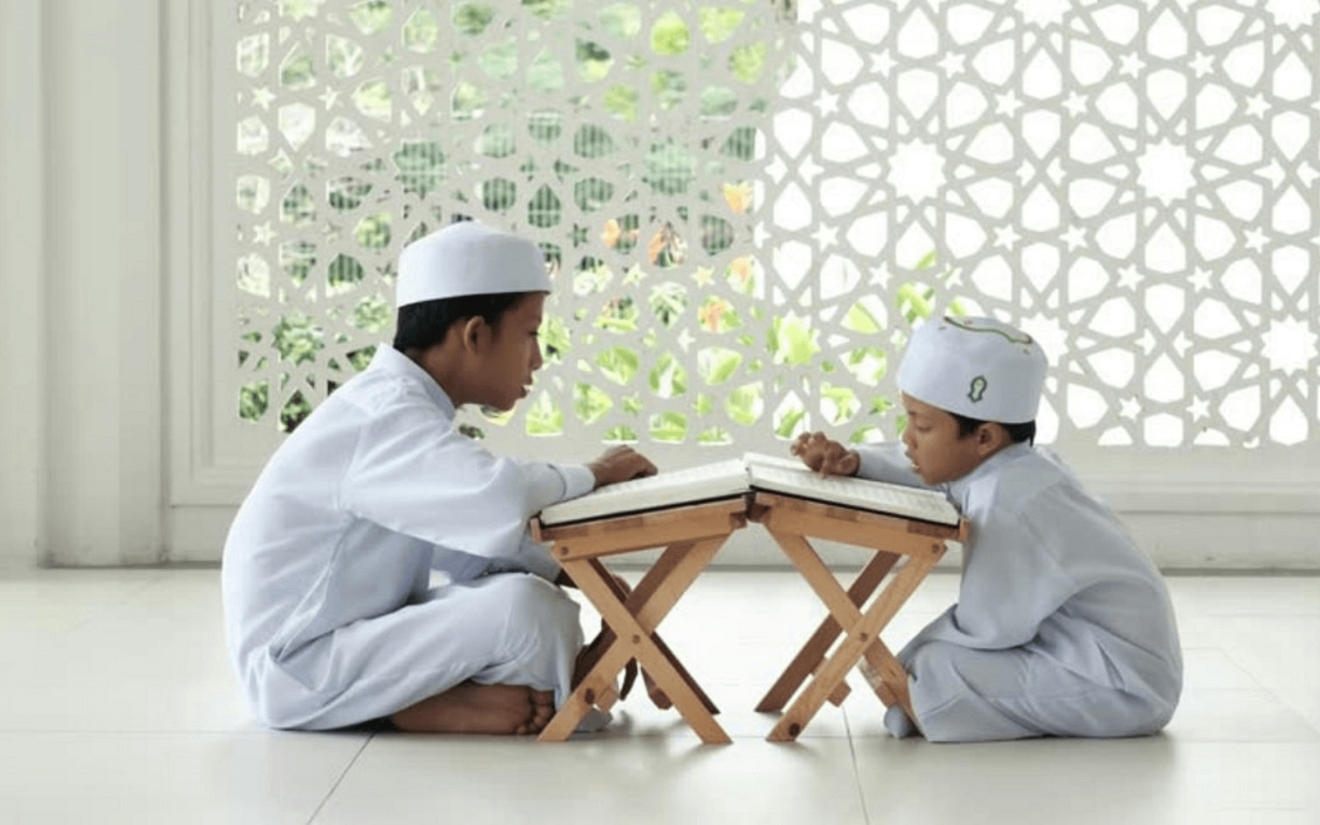 Scholar studying Quran commentary with traditional books